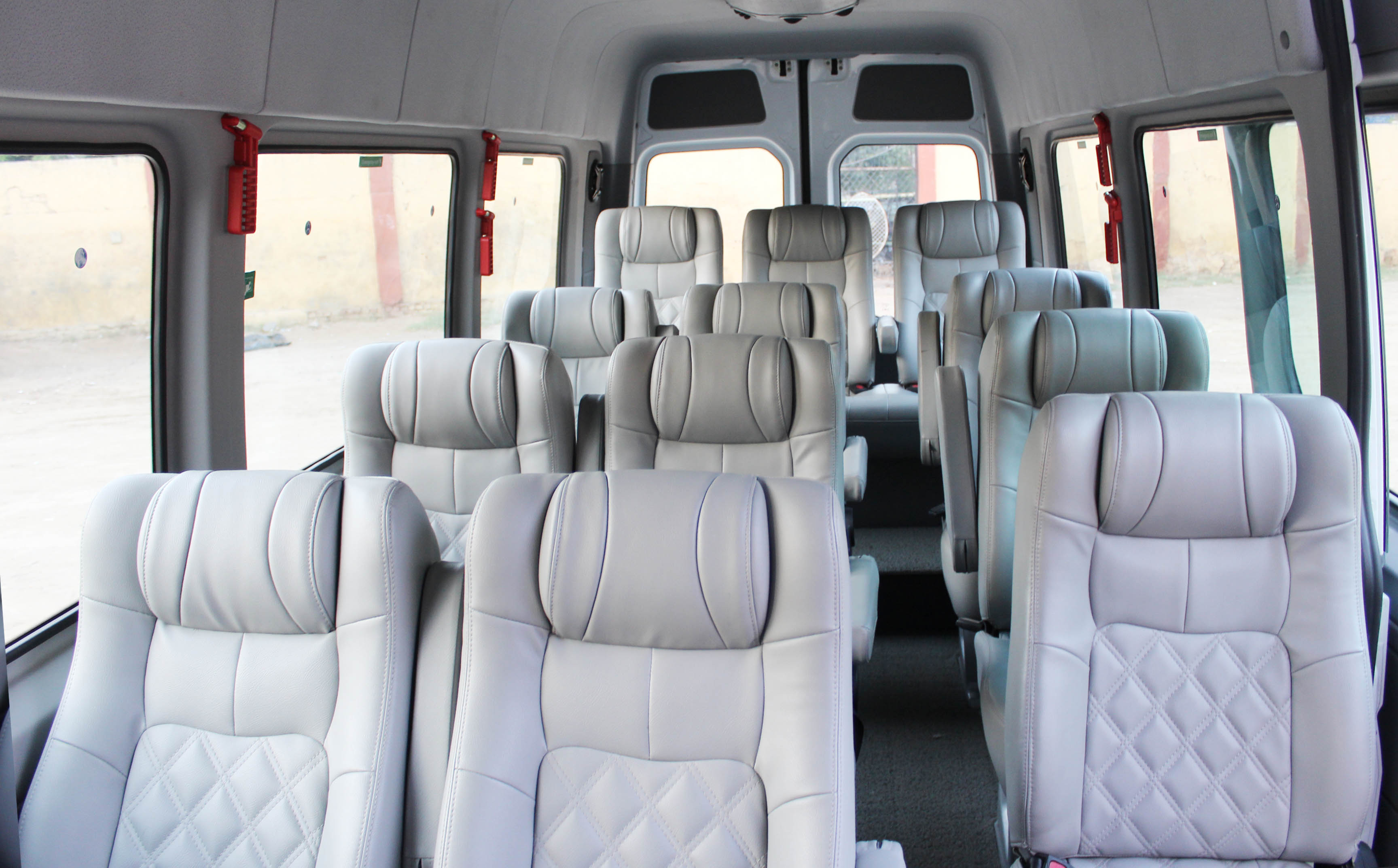 12 seater tempo traveller interior with push-back seats