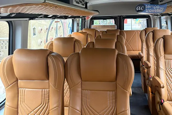 20 seater tempo traveller with tan leather seats
